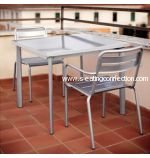 Shown in Aluminum. Chairs and Table Sold Separately